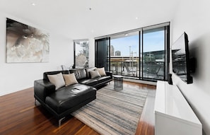 Three Bedroom Two Bathroom Riverfront Water Views | Living area - Aerie Stays Wharf Collection (Docklands)