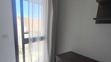 Standard Double Room, Balcony, Partial Ocean View | In-room safe, blackout curtains, iron/ironing board, free WiFi