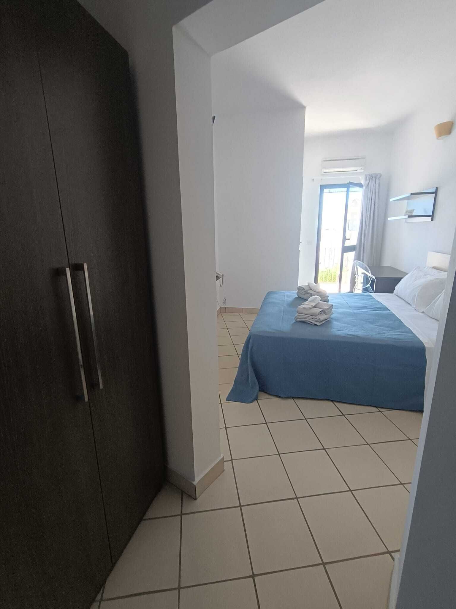 Standard Double Room, Balcony, Partial Ocean View | In-room safe, blackout curtains, iron/ironing board, free WiFi