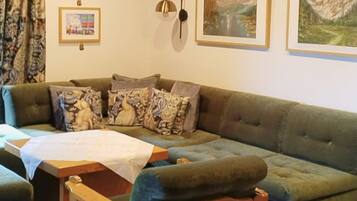 Comfort Apartment, 2 Bedrooms, Balcony, Mountain View | Living area | 50-inch flat-screen TV with cable channels