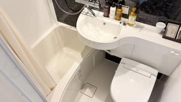 Combined shower/tub, hair dryer, towels, soap