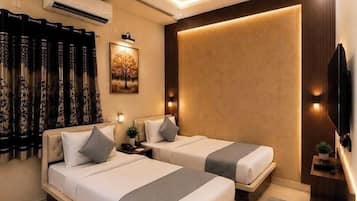 Premium bedding, down duvets, pillow-top beds, free minibar items