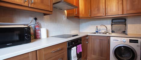 Fridge, oven, electric kettle, toaster