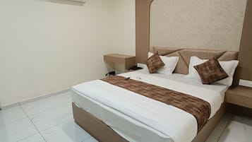 Deluxe Double Room, City View | Desk, laptop workspace, iron/ironing board, free WiFi