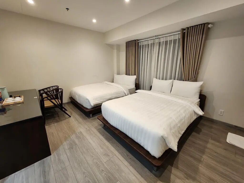 Standard Quadruple Room, Balcony, Garden View | Desk, blackout drapes, iron/ironing board, WiFi (free)