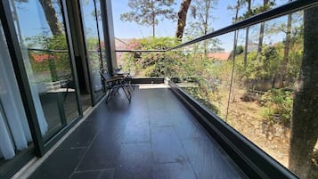 Deluxe Double Room, Balcony, Garden View | Desk, blackout curtains, iron/ironing board, free WiFi