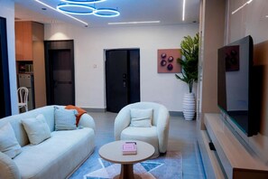 Deluxe Apartment | Living area - TM Luxury Apartment (Lagos)