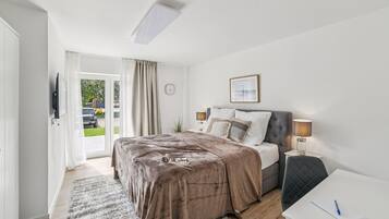 Desk, iron/ironing board, travel cot, free WiFi