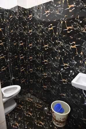 Shower, free toiletries, towels, soap - Hotel SV Near Noida Metro Station 52 (Hosiyarpur JJ Colony sector  Noida)