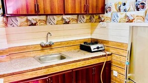 Family Apartment | Private kitchen | Full-size fridge, oven, stovetop, cookware/dishes/utensils - CROWN FURNISHED APARTMENTS SALALAH (SALALAH)