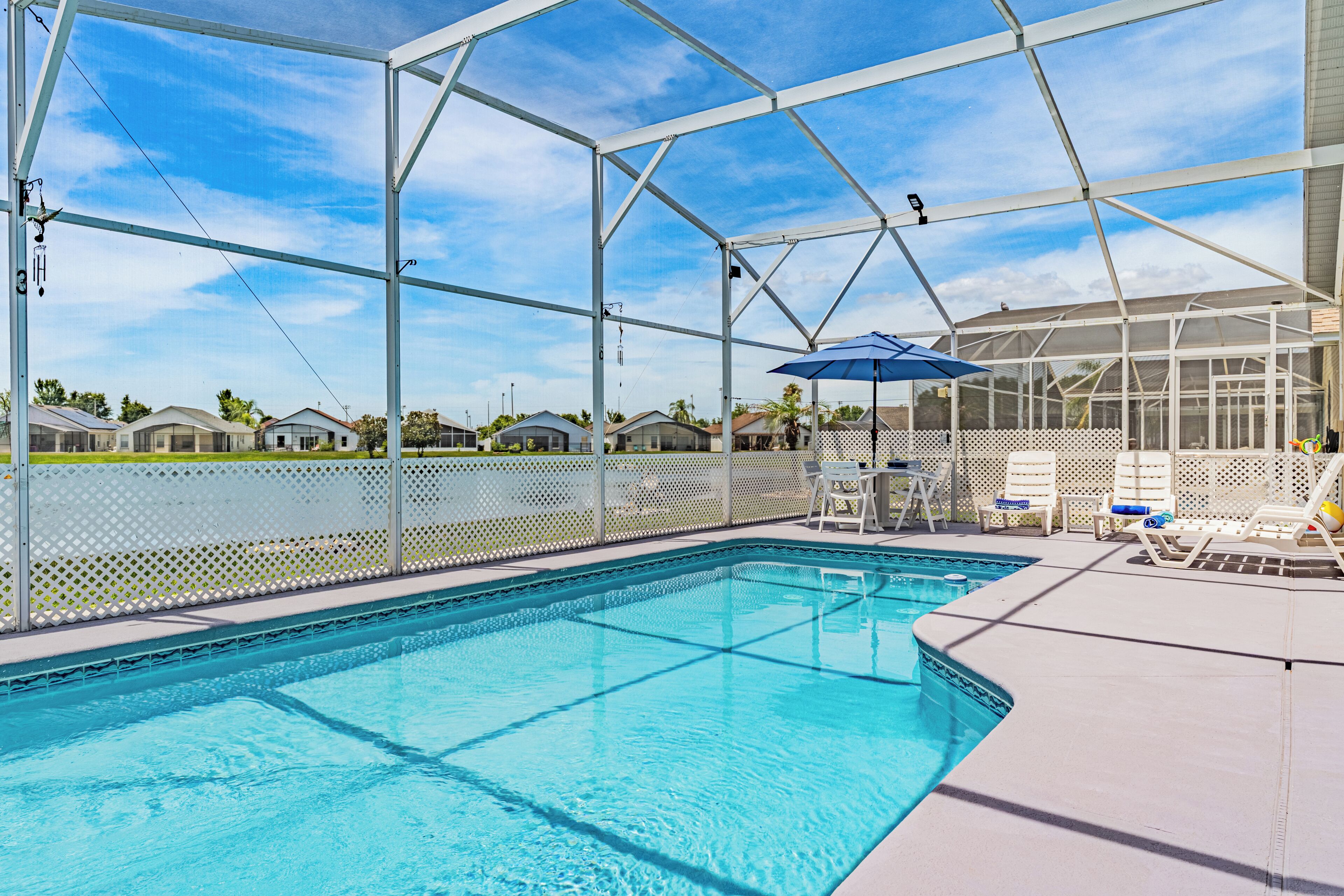 Outdoor pool, pool umbrellas, pool loungers