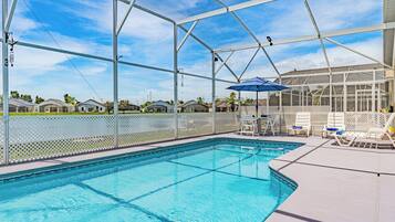 Outdoor pool, pool umbrellas, pool loungers
