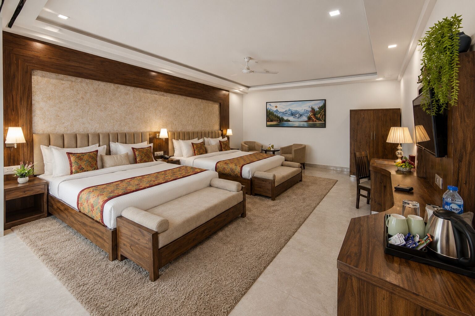 A hotel room with two beds, a desk, a chair, a TV, and a painting on the wall.