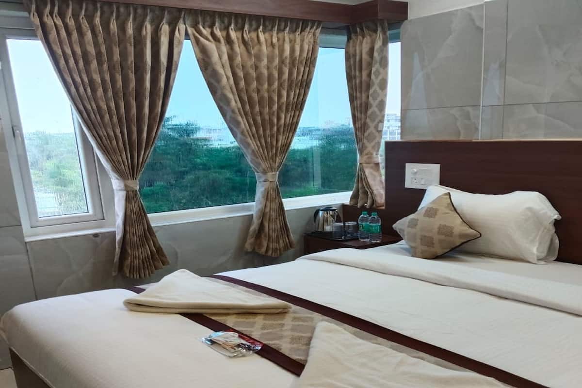 Deluxe Room | Peralatan tempat tidur premium, katil lipat simpan/tambahan 