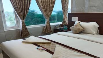 Deluxe Room | Premium bedding, rollaway beds, free WiFi, bed sheets