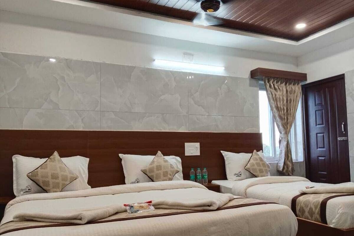 Deluxe Triple Room | Peralatan tempat tidur premium, katil lipat simpan/tambahan 