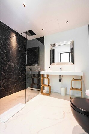 A modern bathroom with a glass shower enclosure, a white sink with a wooden base, and a large mirror. - Exceptional Villa With Pool 5br/10p - Mougins (Mougins)