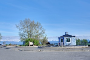 A small blue building with a sign that reads 'Visitor Information.'