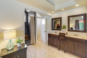 A bathroom with two sinks, a mirror, a cabinet, a lamp, and a plant. - Walk to River + Bike Trail! East Wenatchee Escape (East Wenatchee)