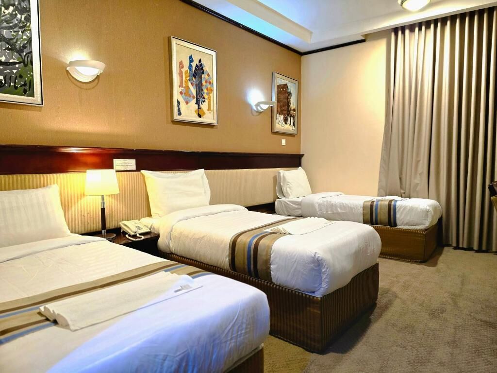 Habitación cuádruple Deluxe | Escritorio y wifi gratis 