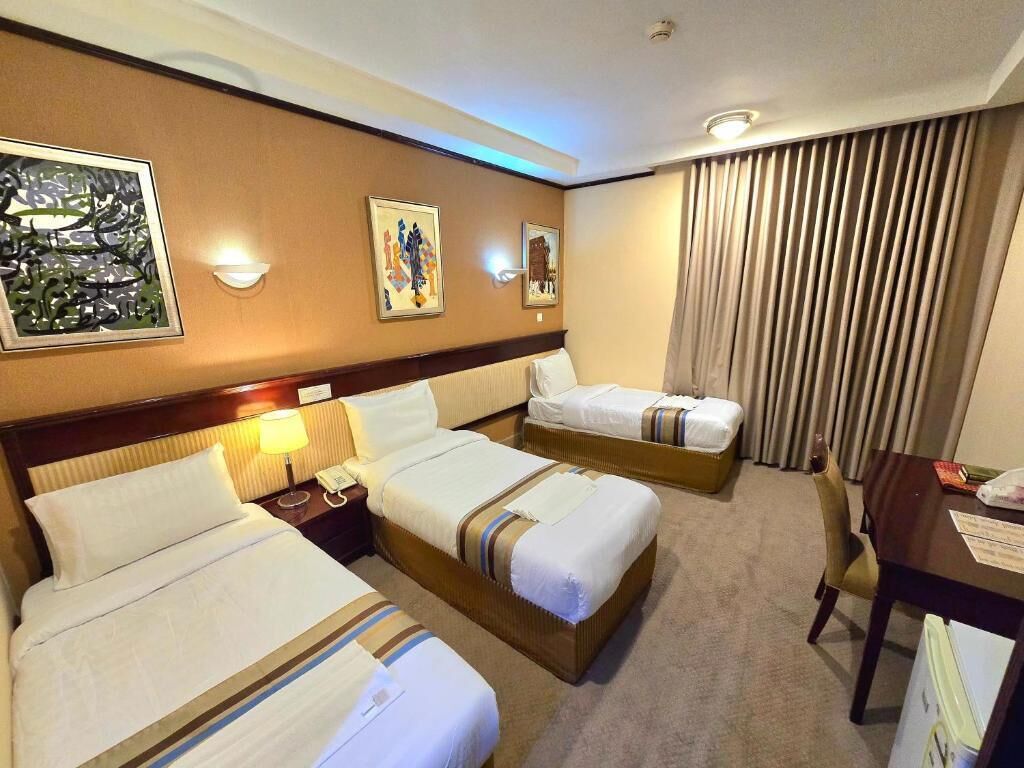 Habitación Deluxe con 1 cama matrimonial o 2 individuales | Escritorio y wifi gratis 