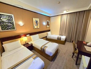 Habitación Deluxe con 1 cama matrimonial o 2 individuales | Escritorio y wifi gratis 