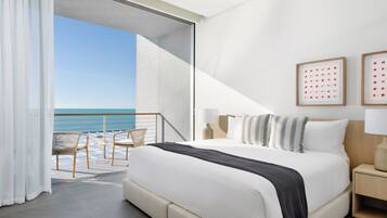 Deluxe Room, Balcony, Beach View | In-room safe, desk, iron/ironing board, free WiFi