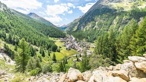 A mountainous landscape with a village nestled in a valley. - Alpine Suite near Saas-Fee | Mountain Views (Saas-Almagell)