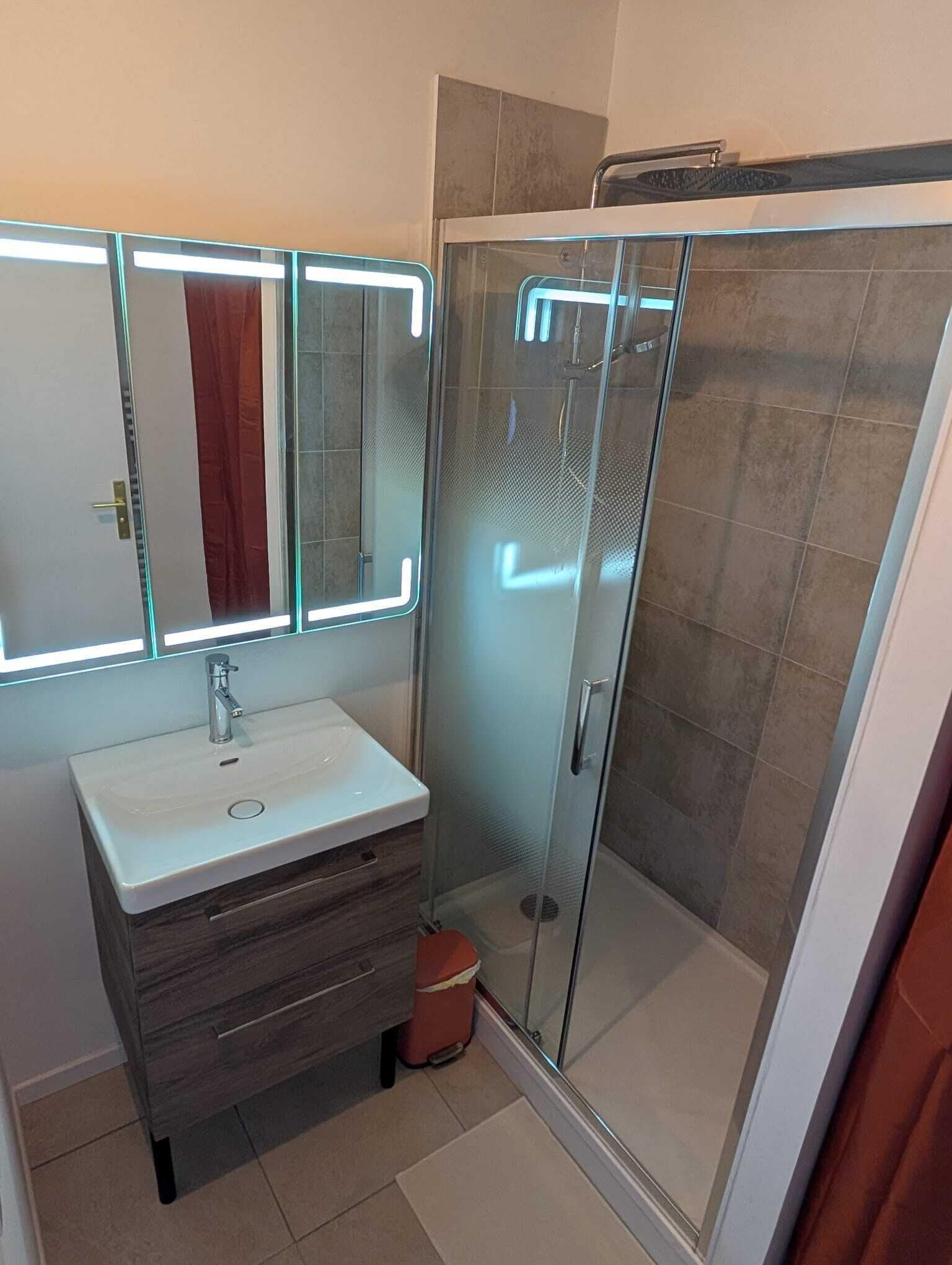 Shower, hair dryer, towels, toilet paper
