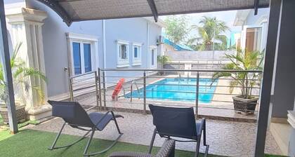 Devon's 5BR pool villa, gated in Sun City Estate, Abuja