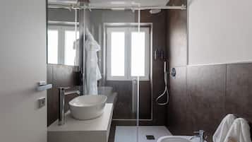 Standard Double Room | Bathroom | Shower, hair dryer, towels, soap