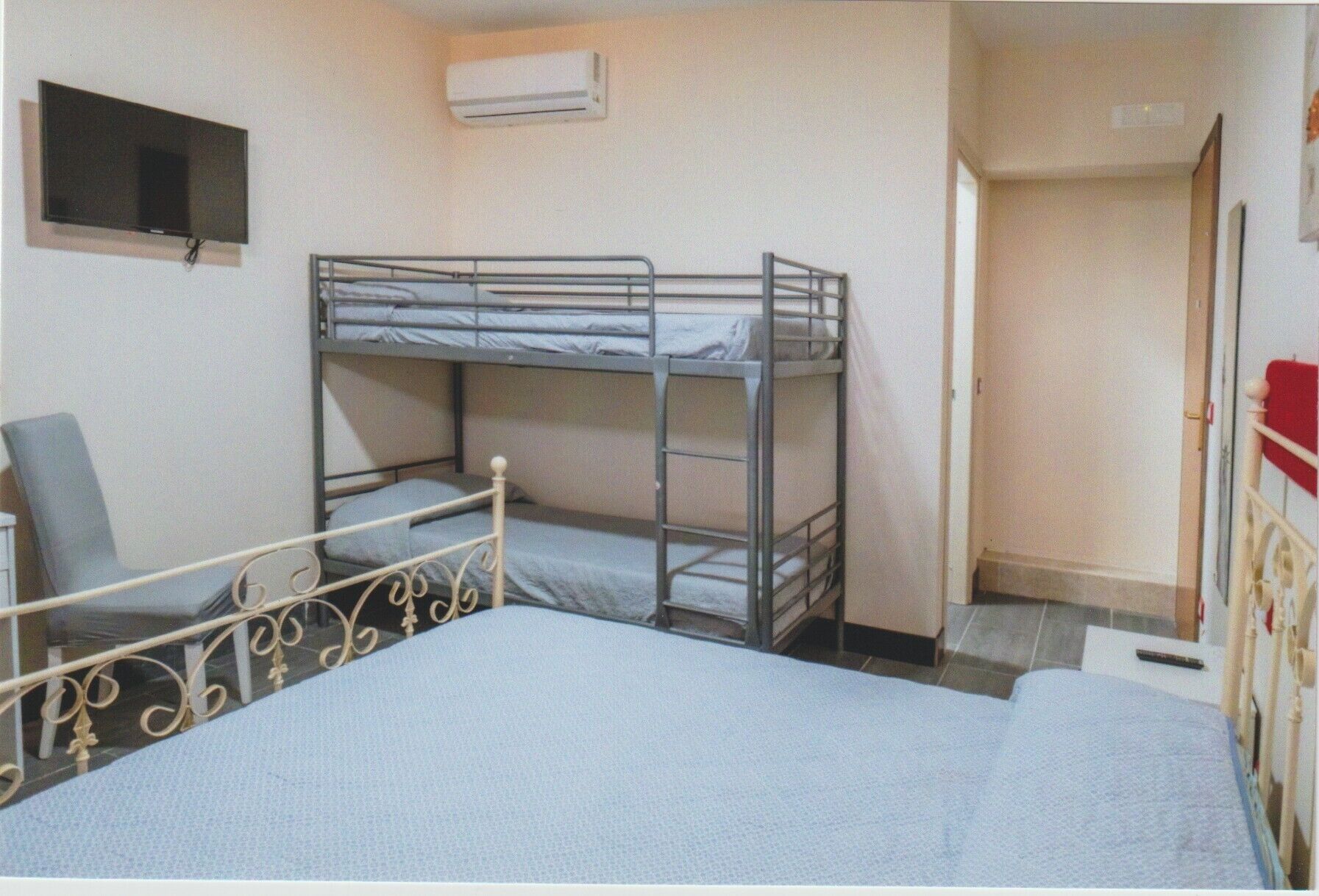 Quadruple Room, Balcony, City View | Iron/ironing board, free WiFi, bed sheets