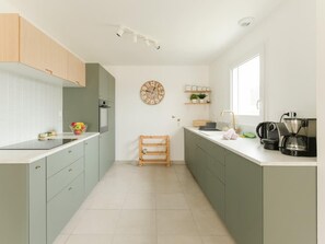 Apartment | Private kitchen | Highchair - Charming Coastal Home in Landunvez (Landunvez)