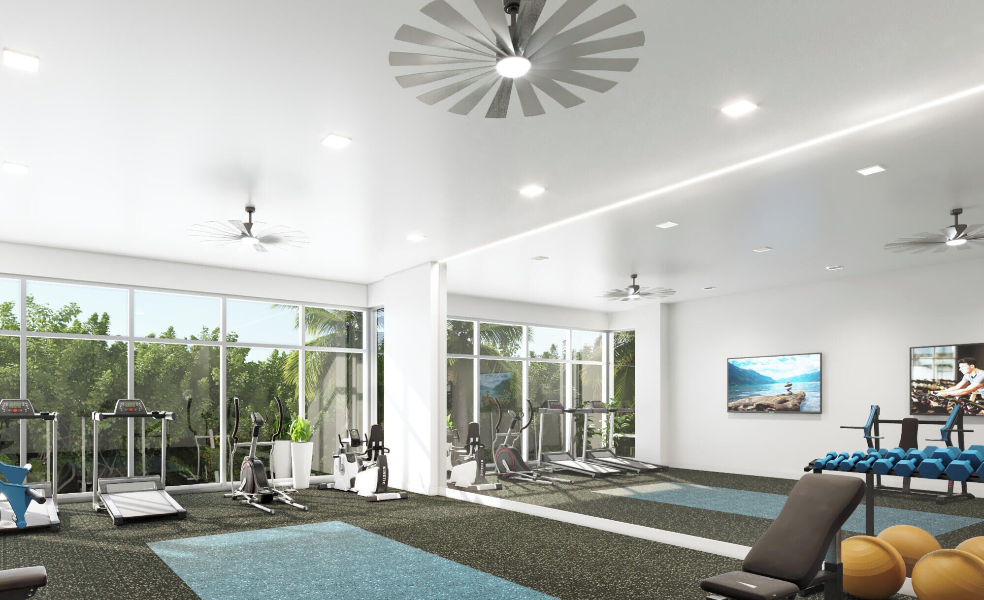 A gym with cardio machines, weightlifting equipment, and large windows.
