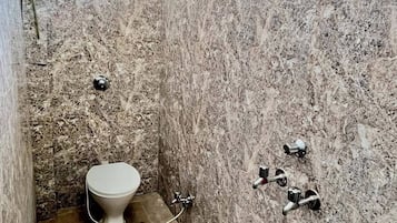 Deluxe Shared Dormitory | Bathroom | Shower, towels, soap, shampoo