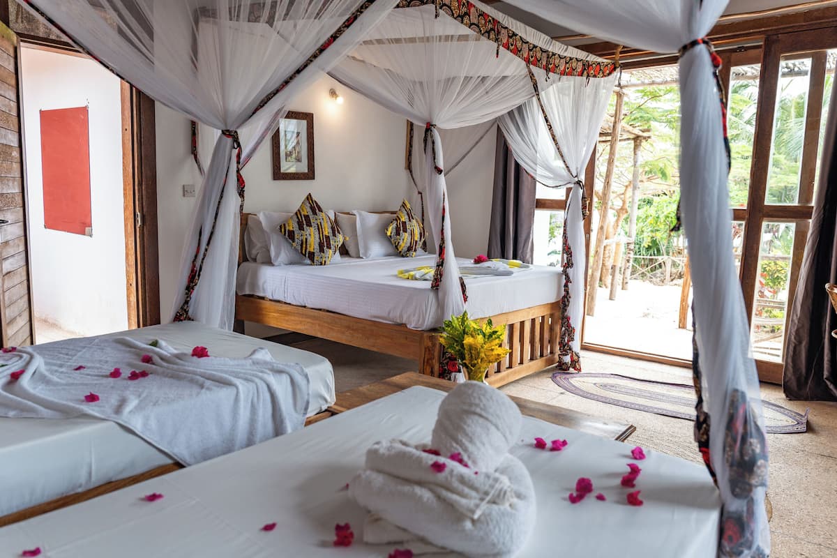 Basic Quadruple Room, Garden View | Free WiFi