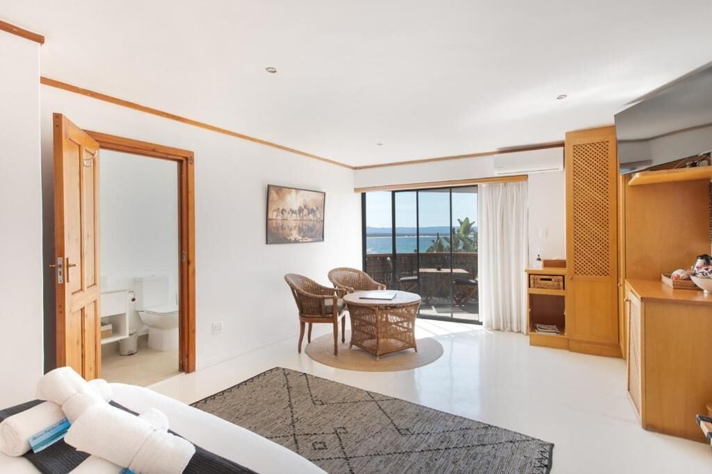Habitación Confort doble, balcón, vistas al mar | Zona de estar