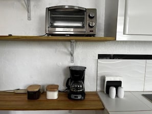 Fridge, coffee/tea maker, paper towels - Cozy Downtown Isabela Private 2-bedroom Apt. near Park, Plaza & Beaches (Isabela)