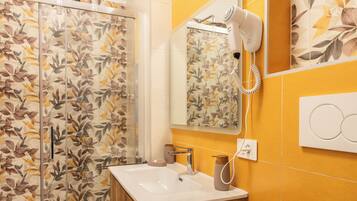 Apartment, 1 Double Bed | Bathroom | Shower, hair dryer, towels, soap