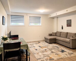 Apartment, 1 Bedroom | Living room - Cozy 1-br Basement Suite in Family-friendly Toronto Neighborhood (Toronto)