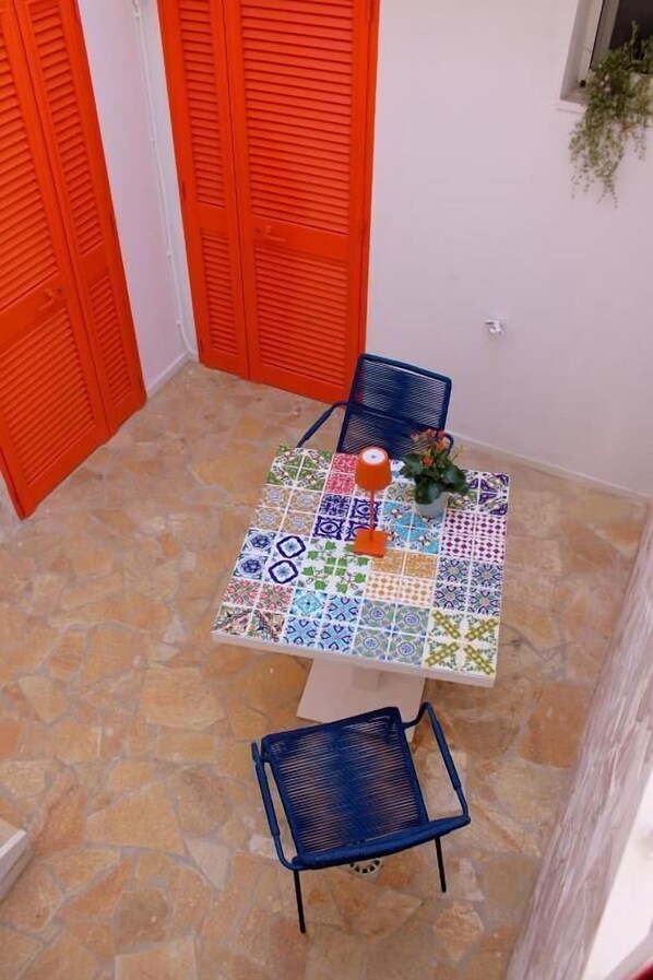 Quadruple Room, Patio | Outdoor dining