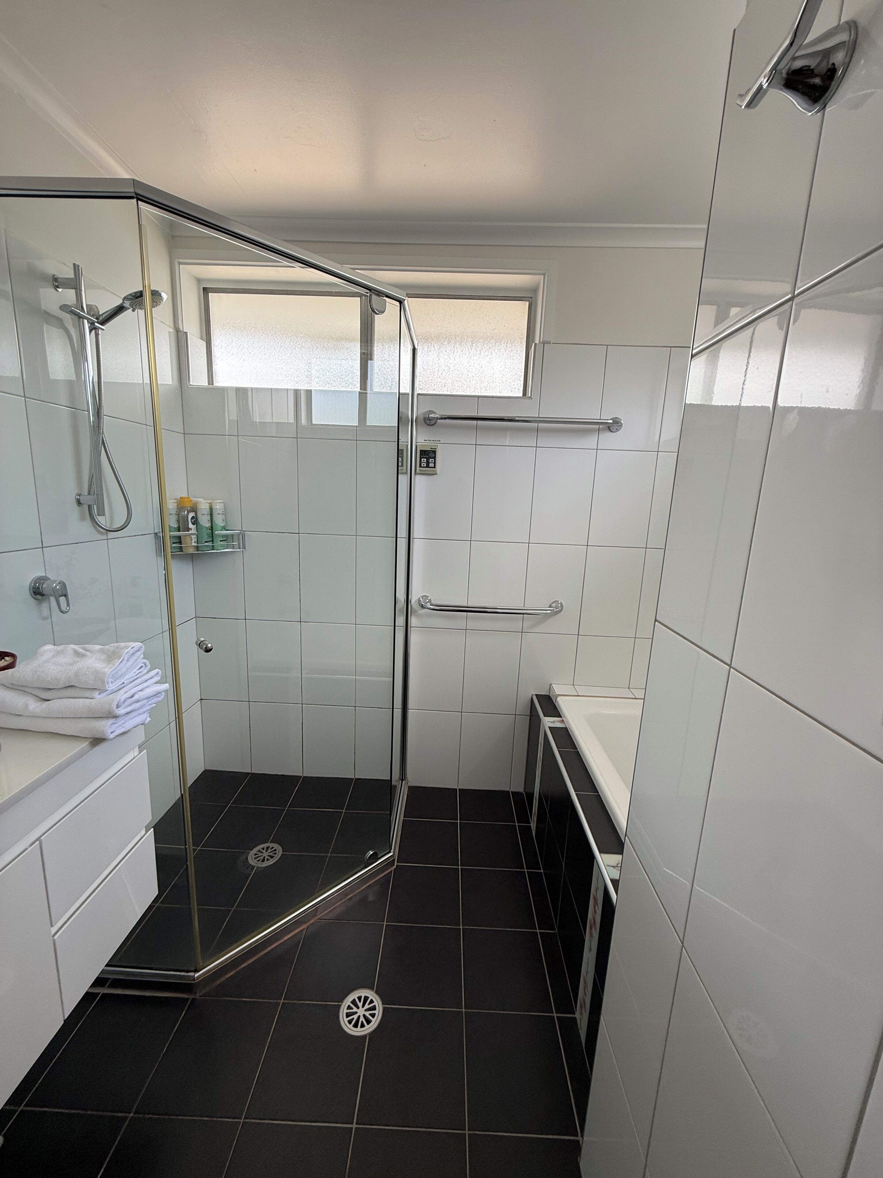 Shower, hair dryer, towels, soap