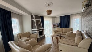 Familieleilighet, bassengutsikt | Oppholdsområde