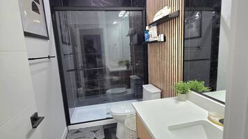 Hair dryer, towels, soap, toilet paper