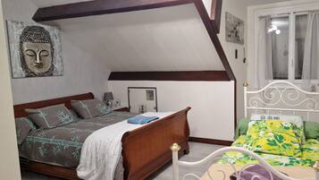 1 chambre, fer et planche à repasser, accès Internet, draps fournis