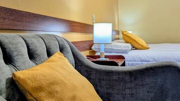 Desk, laptop workspace, free WiFi, bed sheets