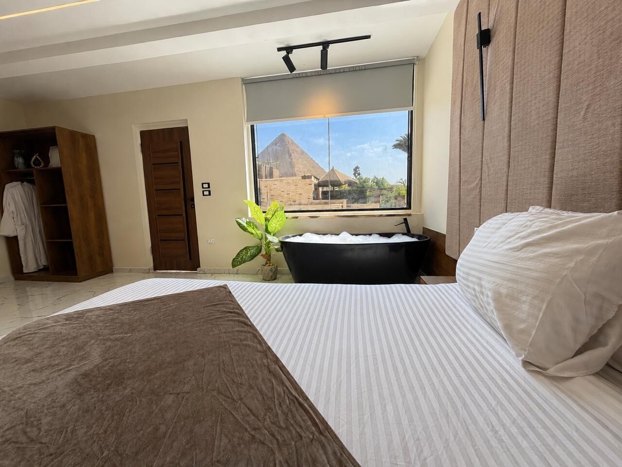 Luxury Quadruple Room, Mountain View | Premium bedding, blackout drapes, iron/ironing board, free WiFi