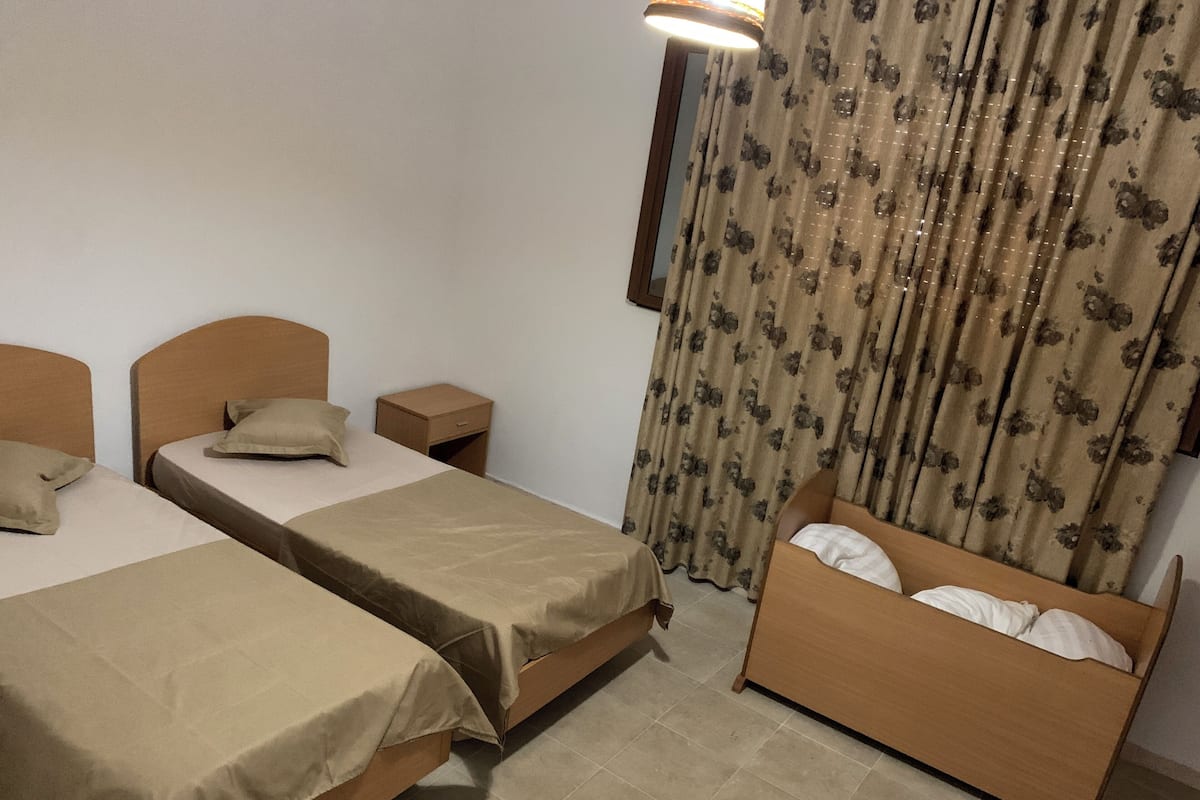 Double Room, Ocean View | Desk, laptop workspace, WiFi (free), bed sheets