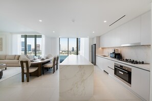 Fridge, microwave, oven, dishwasher - Modern Beachfront 3BR Apt | Near Marina & JBR (Dubai)