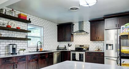 Dog-Friendly home with quick access to the beach and downtown with heated pool.